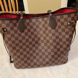 Authentic Louis Vuitton Neverfull MM bag.
